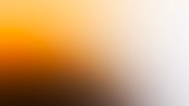 une image floue d'un fond blanc avec un coucher de soleil jaune et orange
