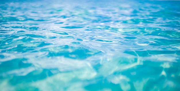 Image de fond. Arrière-plan des vagues de surface de la lagune de la mer claire. Fond d'été