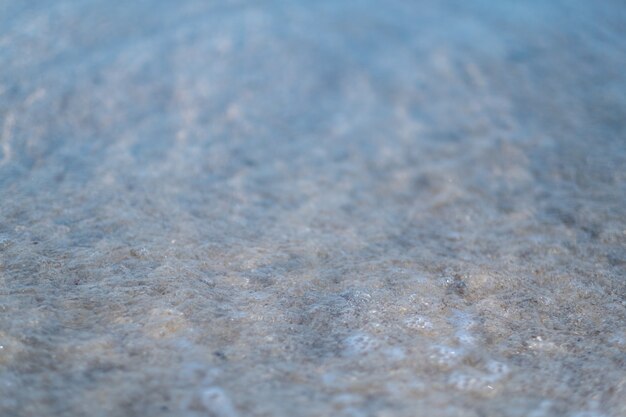 Image gros plan de sable sur la plage blanche tropicale