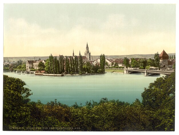 Photo une image d'un lac avec un pont et des arbres en arrière-plan