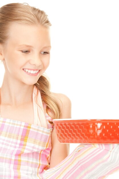 image lumineuse d'une fille de cuisine sur blanc