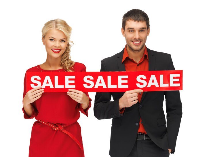 Photo image lumineuse de l'homme et de la femme avec signe de vente