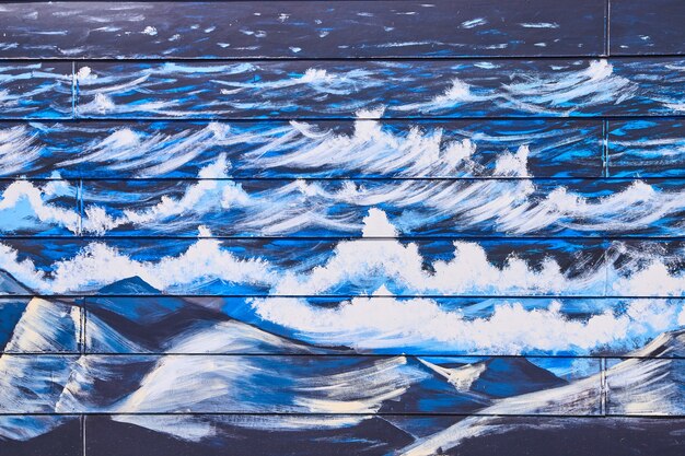 Image de la peinture des vagues du lac sur le mur de vinyle