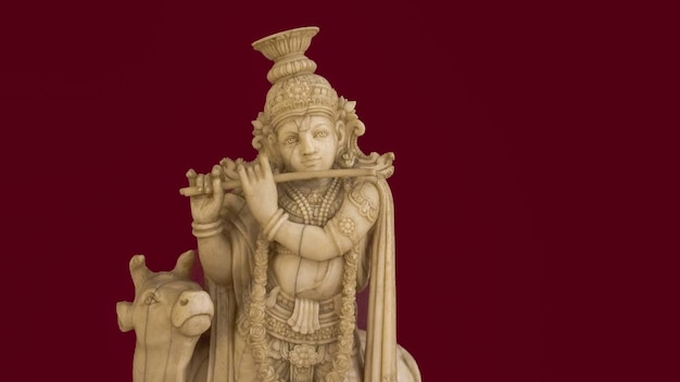 Image de la statue de Dieu Krishna avec image en marbre de vache