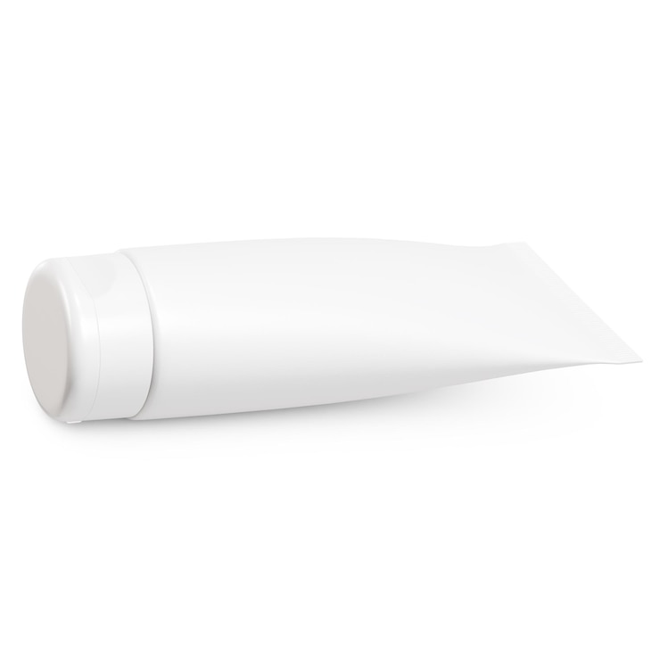 Photo une image vierge d'un tube cosmétique isolé sur un fond blanc