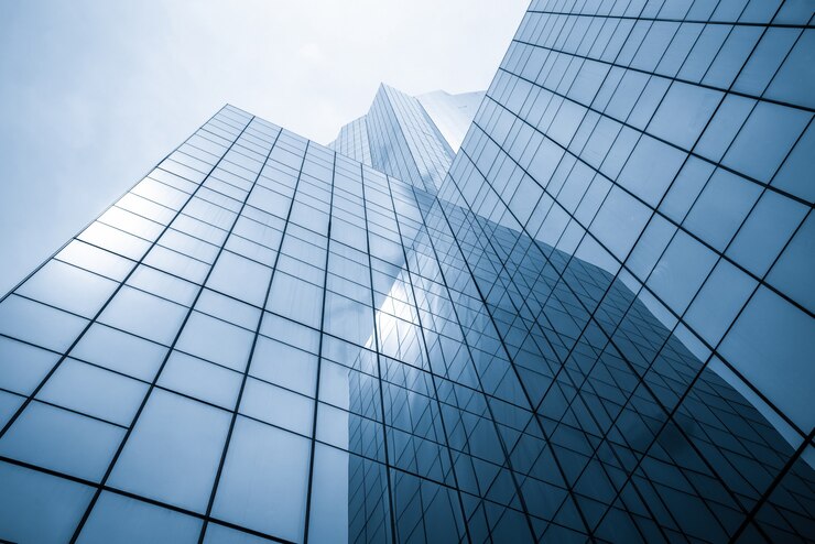 Photo immeuble de bureaux moderne de grande hauteur à la recherche d'un fond abstrait