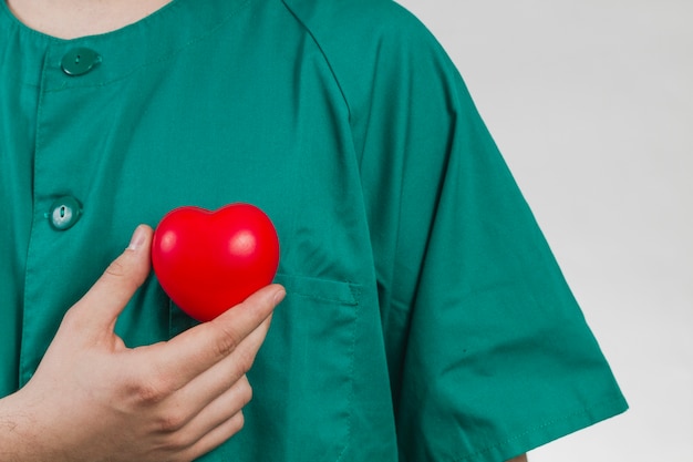 Photo infirmière, tenue coeur en matière plastique