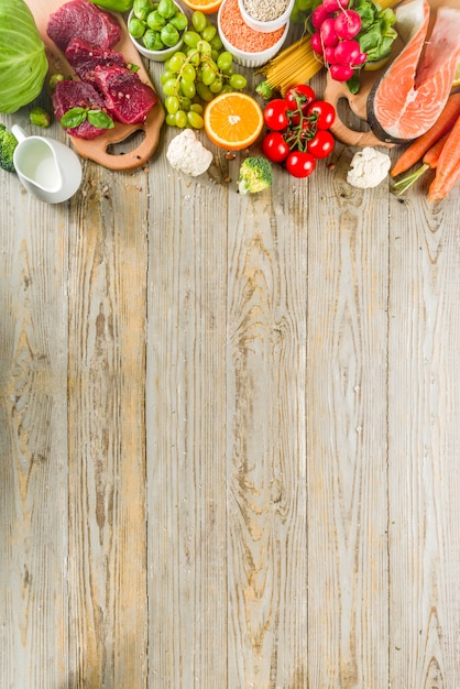 Photo ingrédients alimentaires de fond de régime flexitarien, viande, fruits de mer et légumes