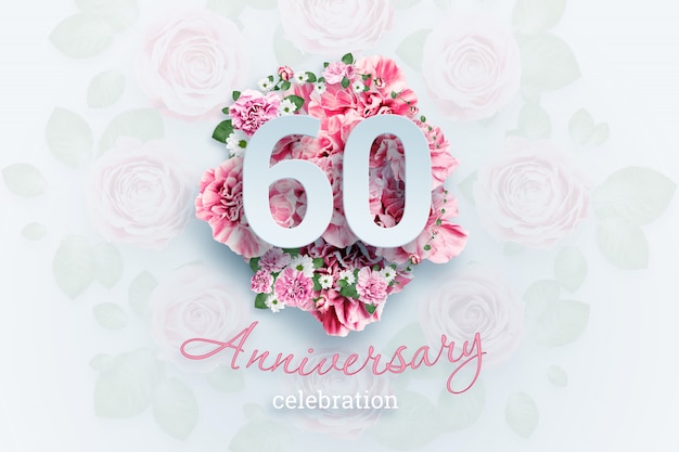 inscription 60 chiffres et texte de célébration d'anniversaire sur les fleurs roses.