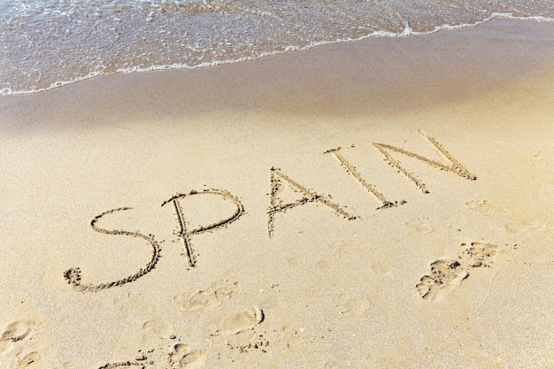 Inscription " Espagne" sur un sable. Costa Dorada, Espagne.