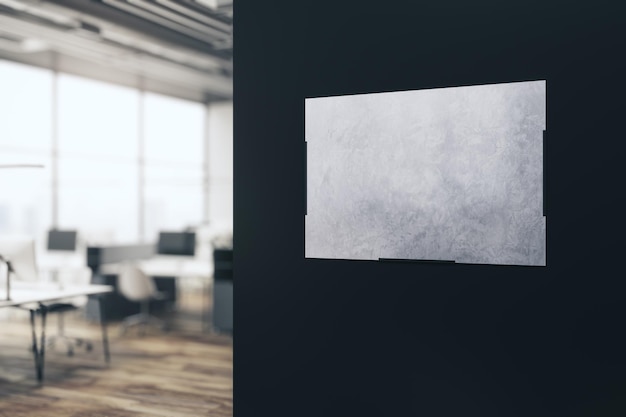 Intérieur de bureau flou moderne avec une bannière vide sur un mur sombre Maquette de rendu 3D