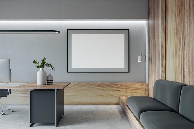 Intérieur de bureau moderne en béton et en bois avec cadre de maquette blanc vide sur l'espace de travail mural et les meubles Rendu 3D