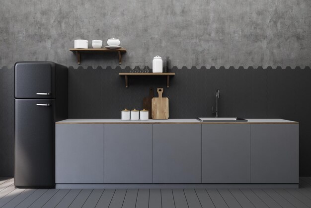 Intérieur de cuisine noir et béton avec des carreaux hexagonales, un comptoir avec des étagères et une planche à couper et un réfrigérateur noir dans le coin.