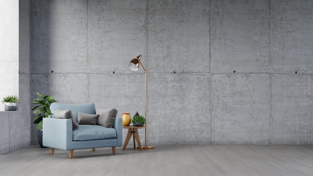 Intérieur du salon avec table en bois, lampes et fauteuil bleu ont mur de ciment.