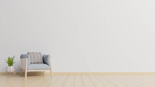 L'intérieur a un fauteuil sur fond de mur blanc vide.