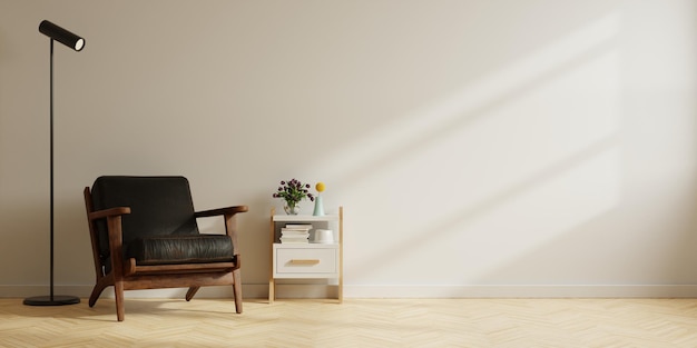 Intérieur minimaliste moderne avec un fauteuil en cuir noir sur fond de mur blanc vide