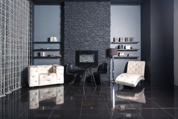 Intérieur noir de luxe moderne et sombre avec des meubles chic blancs