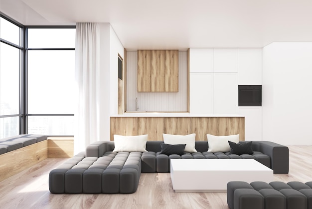 Photo intérieur de salon blanc et bois avec un canapé noir, une table basse carrée blanche et une cuisine en arrière-plan. maquette de rendu 3d