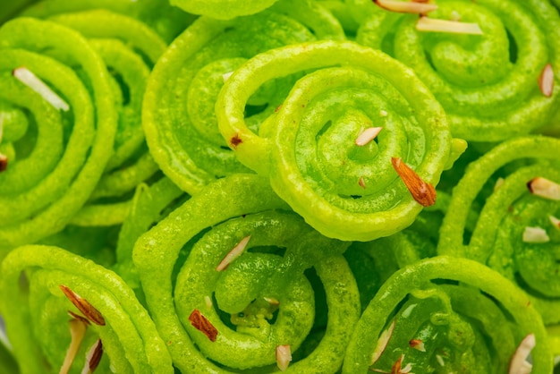 Jalebi mithai vert ou bonbon de l'Inde une torsion à un imarti ou jilbi traditionnel