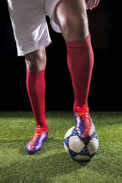 Photo les jambes du footballeur