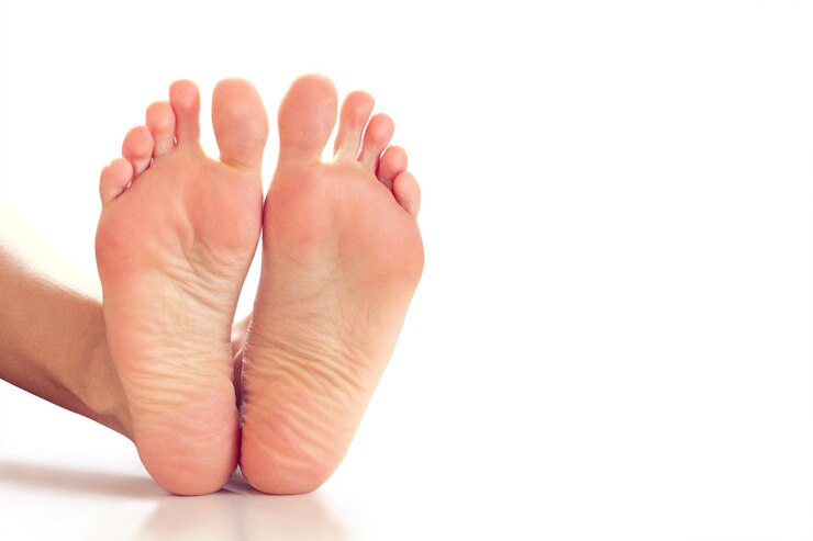 Photo jambes féminines sur fond blanc