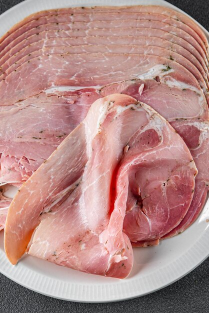 jambon tranche de viande de porc manger cuisiner apéritif repas nourriture collation sur la table copie de l'espace arrière-plan de la nourriture