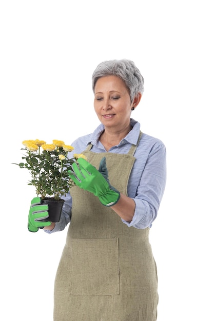 Jardinier ou fleuriste avec fleur