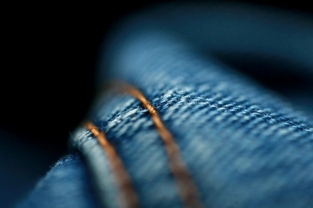 Jeans denim texture close up focus un seul point doux fond d'écran estompé