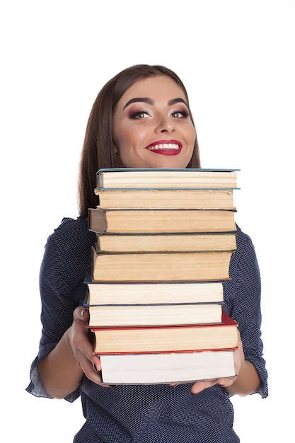 Jeune beauté femme avec des livres à fond blanc