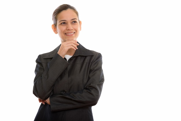 jeune femme d'affaires heureuse souriant et pensant