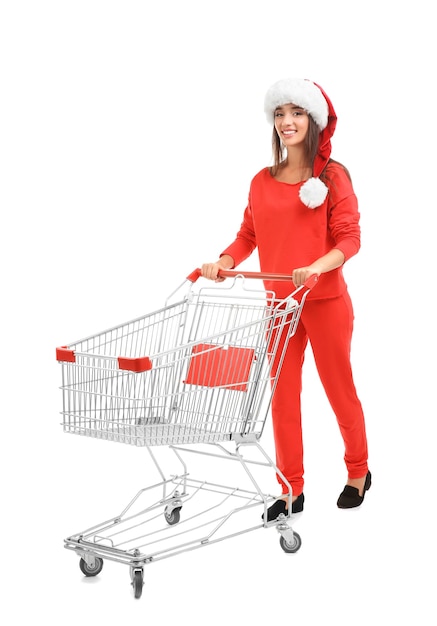 Jeune femme au bonnet de Noel avec panier. Notion de lendemain de Noël