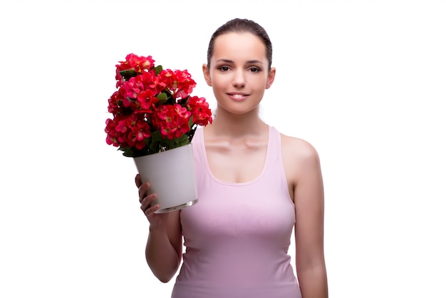 Jeune femme avec pot de fleur isolé sur blanc