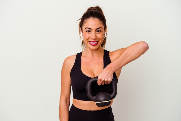 Jeune femme de remise en forme avec des haltères isolé sur fond blanc