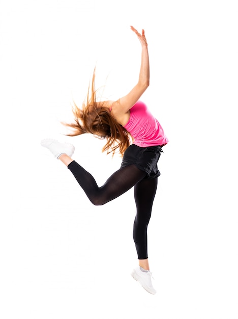 Photo jeune fille danse sur blanc isolé