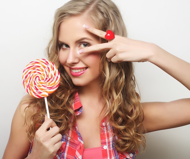 Jeune fille avec lolipop