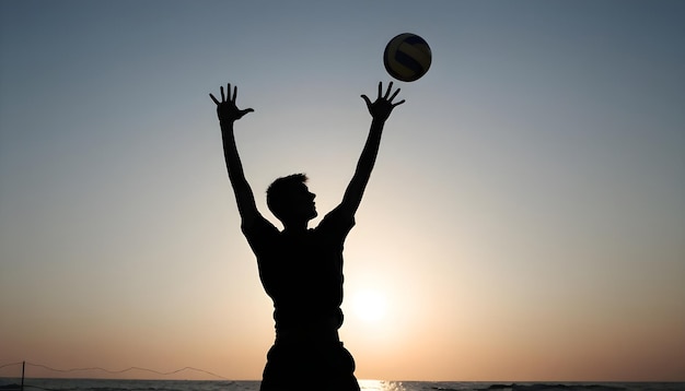 Un jeune homme avec une balle de volleyball.