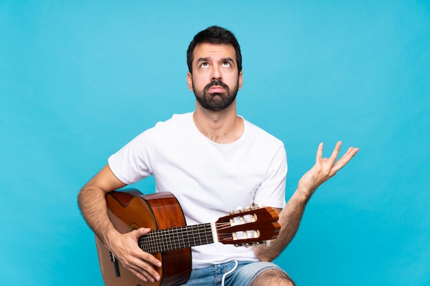 Jeune homme à la guitare