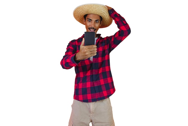 Jeune homme portant des vêtements traditionnels pour le festival brésilien de juin