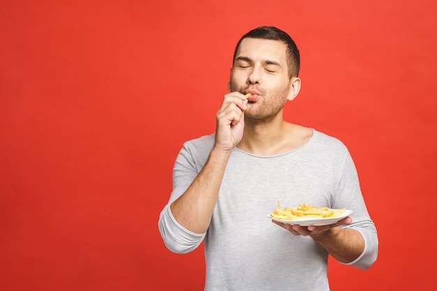 Jeune homme, tenue, frites