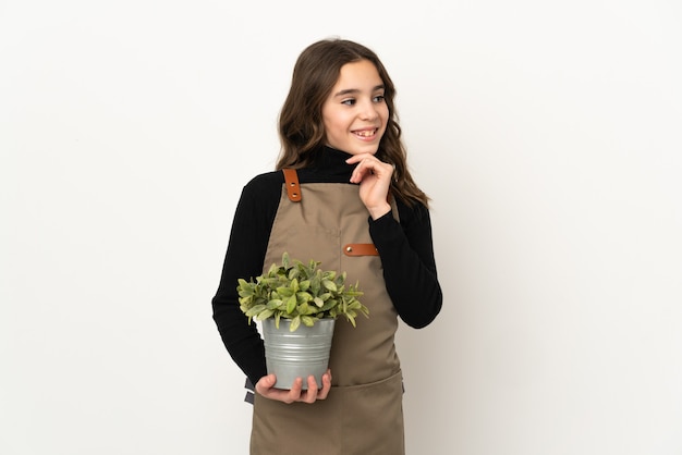 Jeune jardinier sur fond isolé