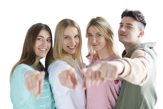 Jeunes pointant vers vous debout ensemble