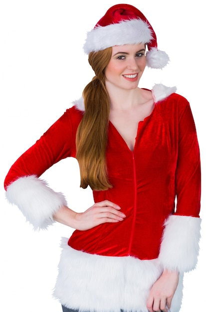 Jolie fille en costume de santa, souriant à la caméra