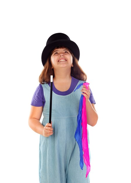 Jolie petite fille faisant de la magie avec un chapeau haut de forme et une baguette magique