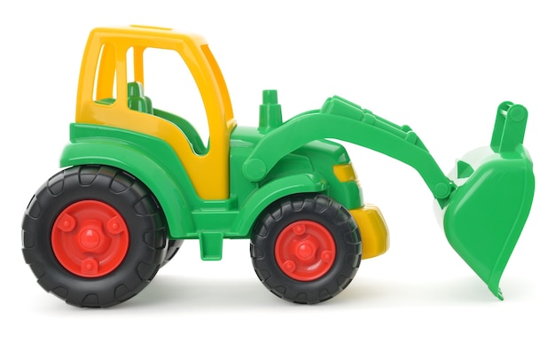 Jouet en plastique pour enfants, bulldozer jaune-vert isolé sur blanc