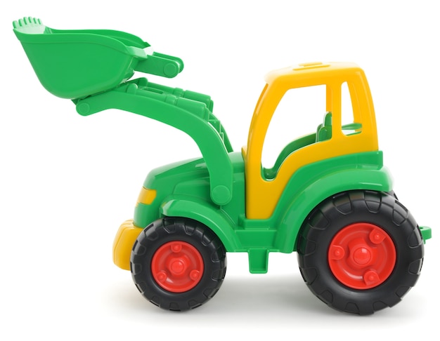 Jouet en plastique pour enfants, bulldozer jaune-vert isolé sur blanc