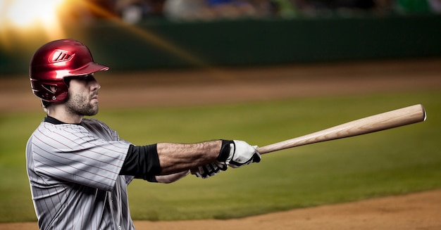 Joueur de baseball sur un stade de baseball.