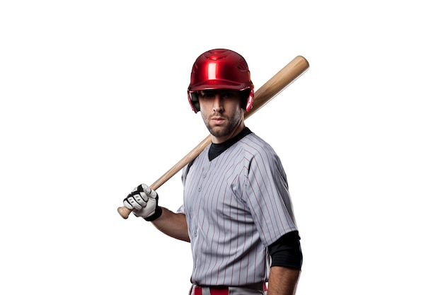 Joueur de baseball en uniforme rouge, sur fond blanc.