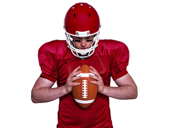 Joueur de football américain tenant une balle