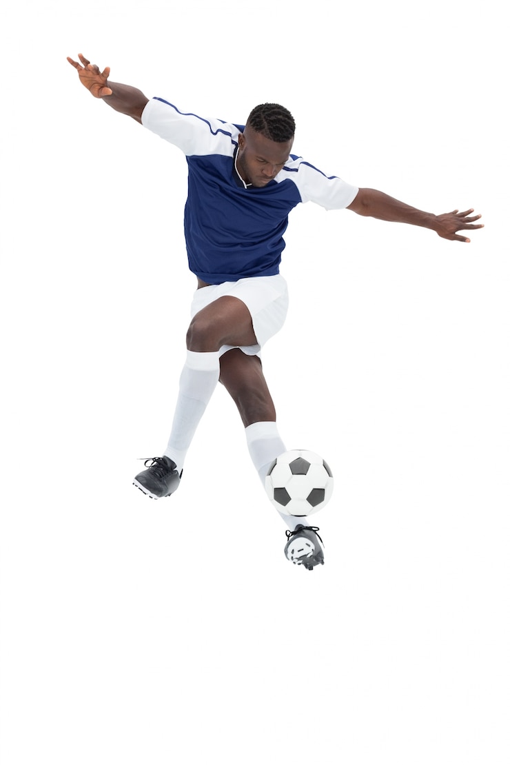 Photo joueur de football en ballon de contrôle de jersey bleu