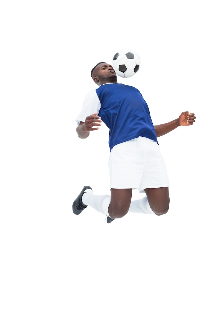 Photo joueur de football en ballon de contrôle de jersey bleu